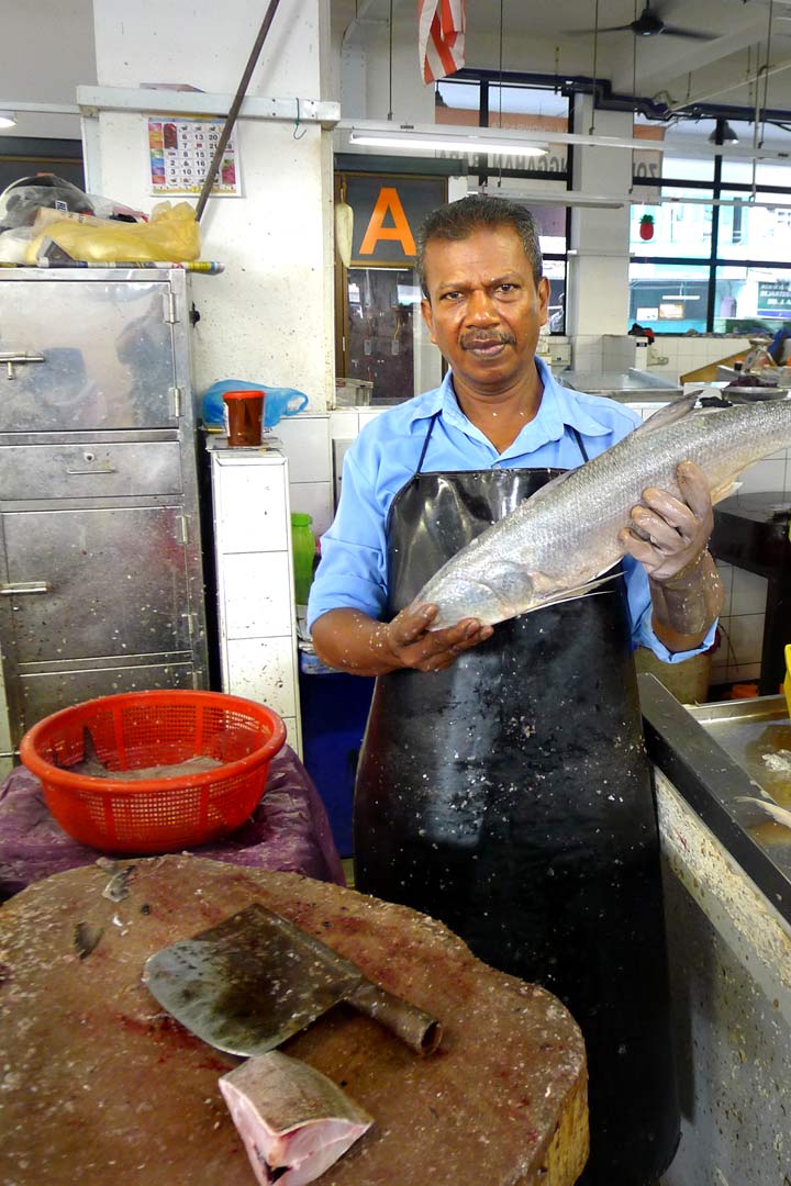 Fishmonger at Chowrasta Market Penang